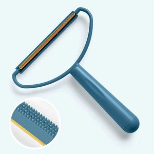 Carpet pet hair remover tool in blue on a light background