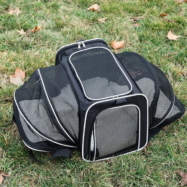 Airline-approved expandable pet carrier bag, breathable mesh design for comfortable and safe travel with your pet.