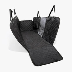 Black quilted hammock fully installed with visible mesh divider