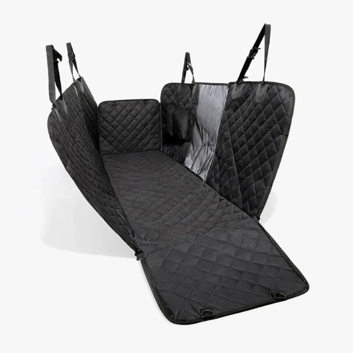 Black quilted hammock fully installed with visible mesh divider