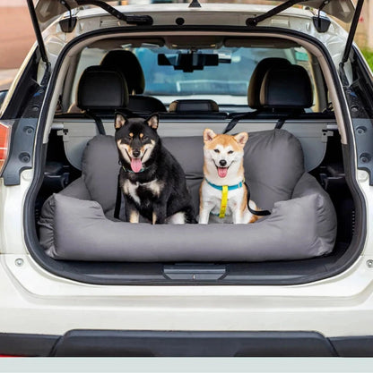 Two Shiba Inu pets relaxing in a car pet bed large, providing comfort during travel