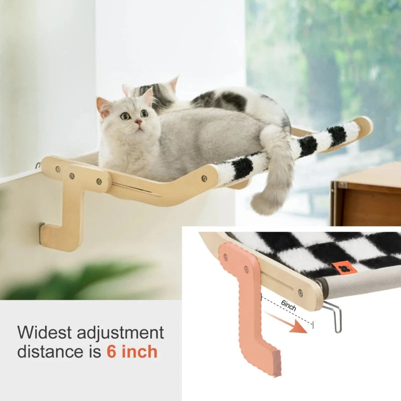 Two cats relaxing on a stylish window hammock with an adjustable distance of 6 inches for comfort.