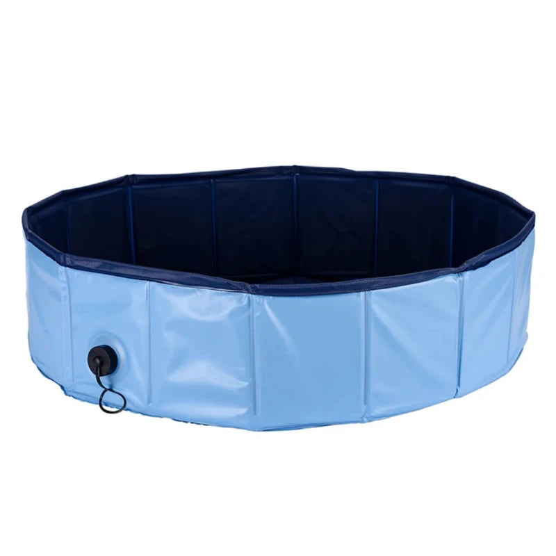 Blue collapsible dog swimming pool, portable and easy to set up for outdoor fun and cooling off your pets during summer.