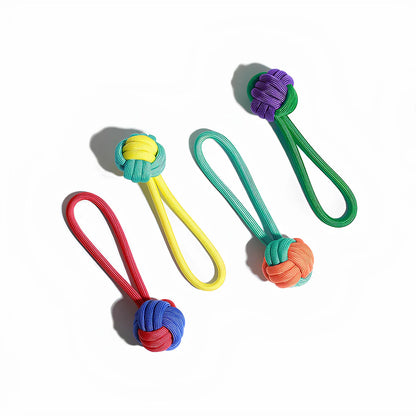 Set of colorful rope ball dog toys with sturdy loops, ideal for tugging and chewing activities.