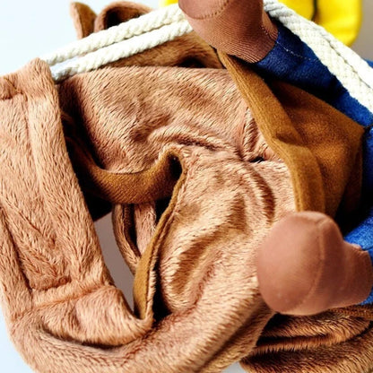 Close-up of the soft plush fabric details of a cowboy rider dog costume, showcasing the comfort and quality material.