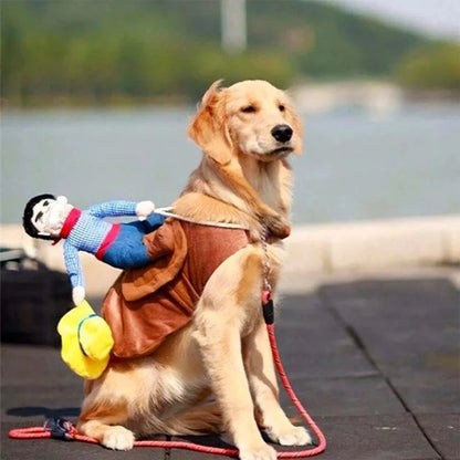 Golden retriever in a cowboy rider costume with plush doll, great for Halloween or pet dress-up events.