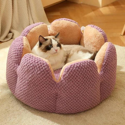 Cozy purple cactus-shaped cat bed offering comfort and warmth for pets, ideal for indoor lounging and relaxation.