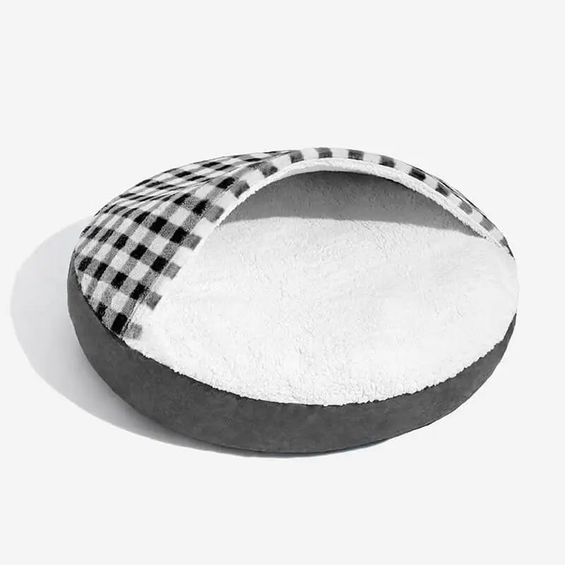 Cozy covered dog bed with plaid canopy and soft fleece interior, providing warmth and comfort for small to medium pets.