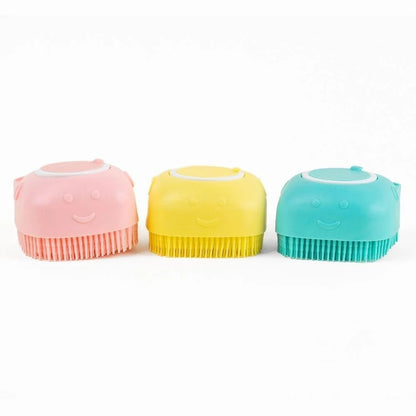 Colorful dog bath brushes with shampoo dispensers in pink, yellow, and teal. Gentle grooming tools for pets' bath time.