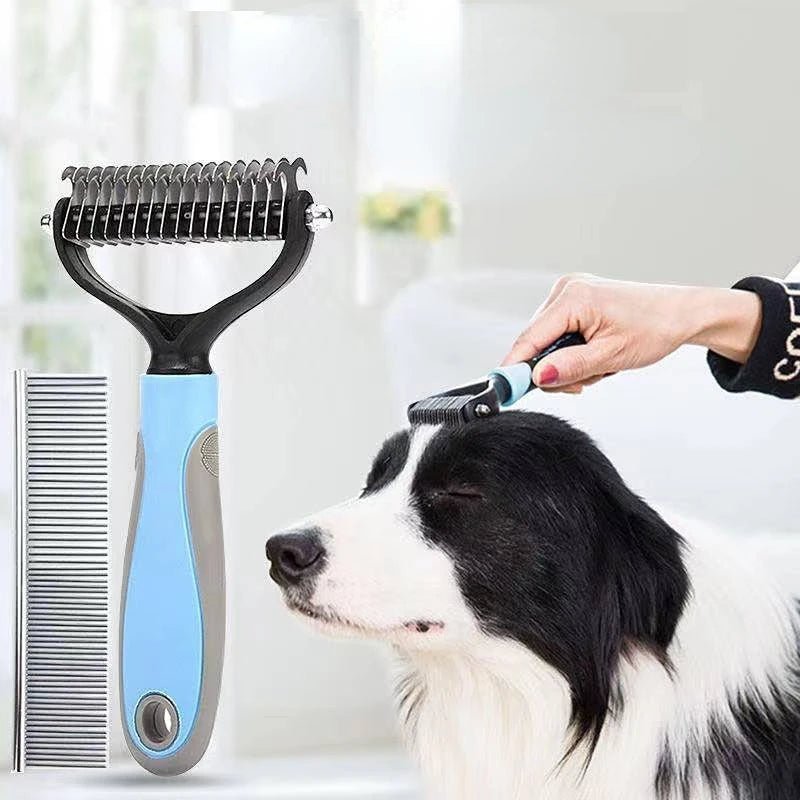 A hand using a shedding brush for dog on a black and white coat indoors