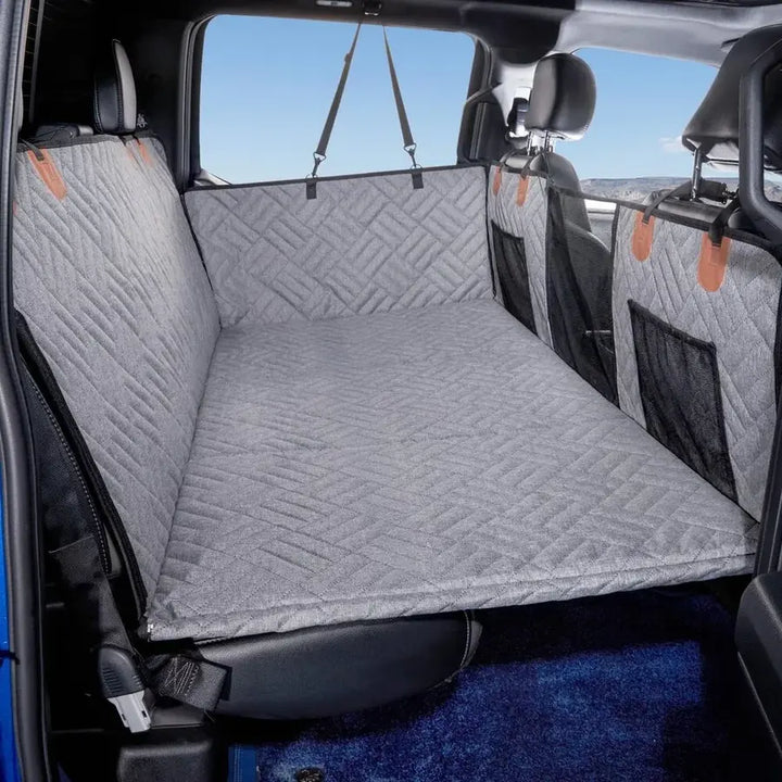 gray back seat extender cover for dogs installed across the rear seat