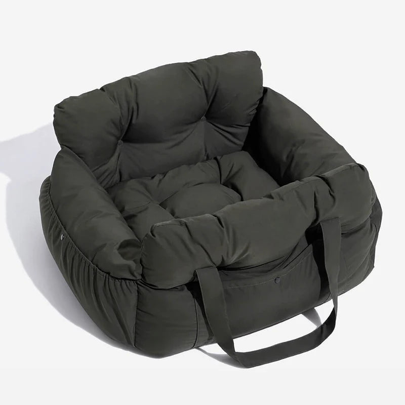 Cozy dog bed with plush cushioning and carrying handles for easy transport and comfort for your pet.