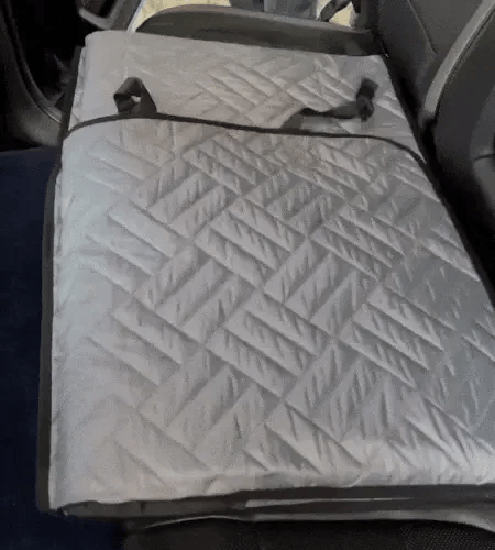 Installing dog hard bottom car seat cover using strong buckle straps