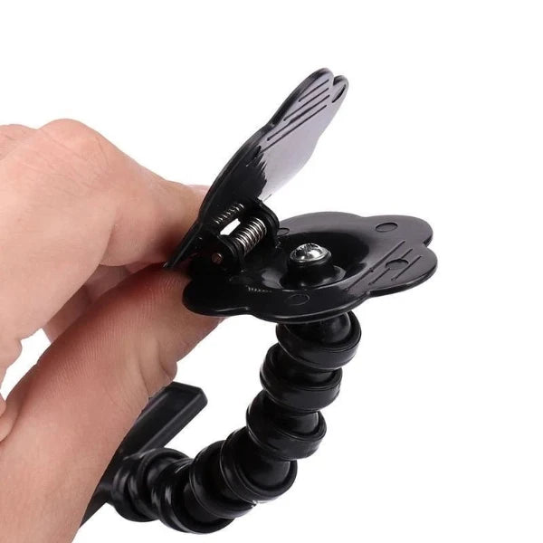 Close-up of the flexible dog selfie stick clip, designed to securely hold treats for capturing your pet's perfect photos.