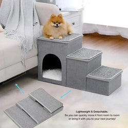 Small dog stairs beside a sofa in gray fabric indoors