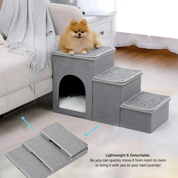 Small dog stairs beside a sofa in gray fabric indoors
