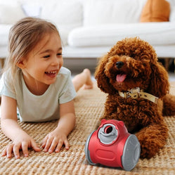 Food dispensing dog toy placed on a rug beside a dog and child