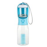 Blue dog water bottle with a strap and built-in cup in studio