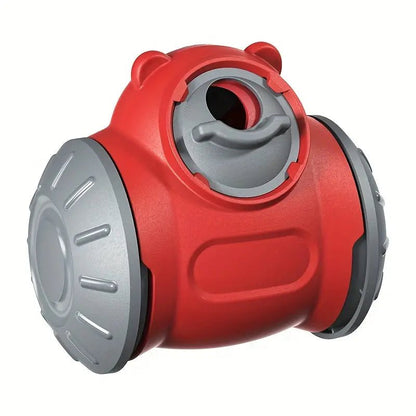 Interactive red and gray dog treat dispenser toy with a rotating design for mental stimulation and reward-based play.