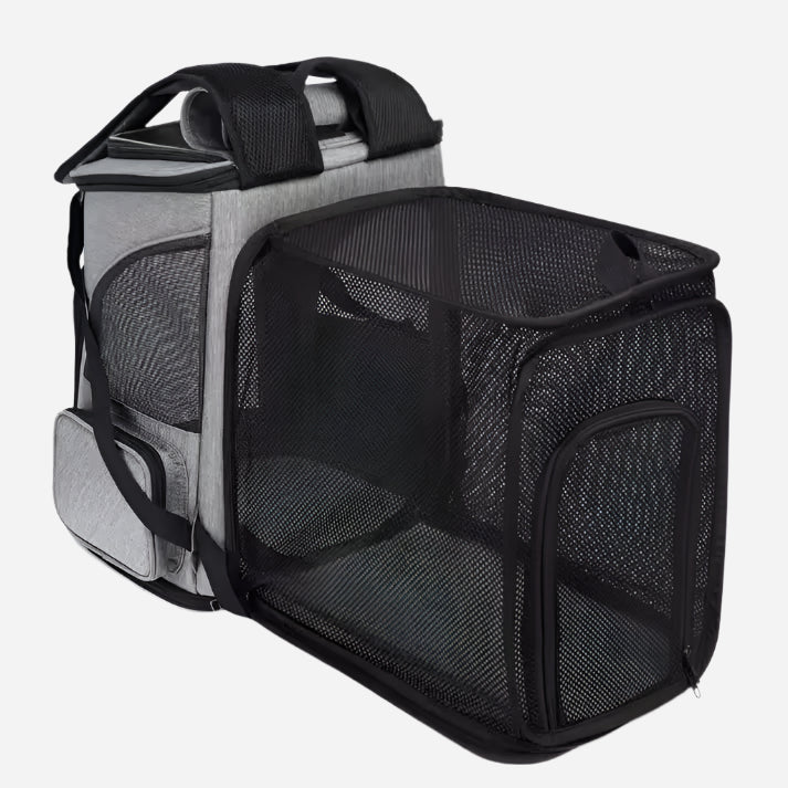 Expandable pet carrier backpack with breathable mesh sides and a comfortable design.
