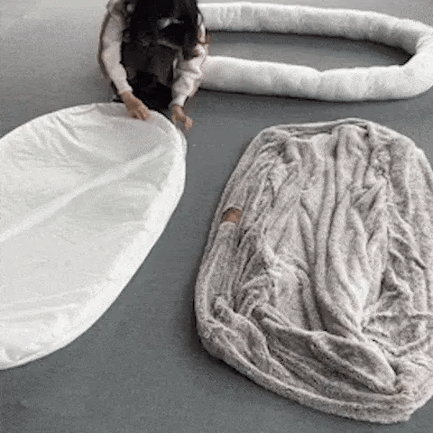 The cover is removed and washed, ideal for giant breed dog beds