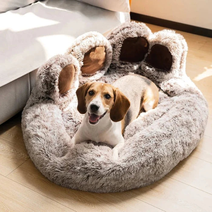 Fluffy paw-shaped dog bed with plush comfort, perfect for small to medium dogs, provides warmth and support for relaxation.