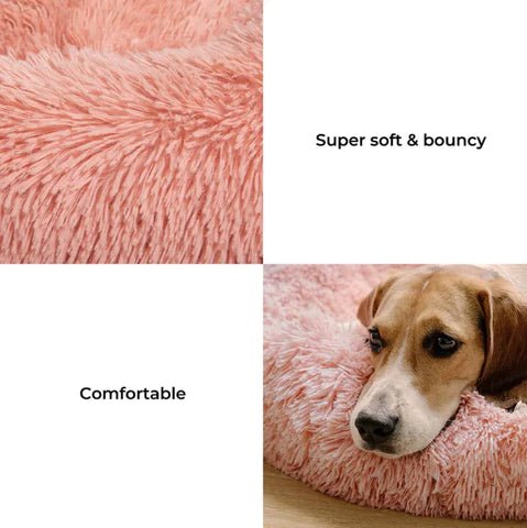 Super soft and bouncy pink fluffy dog bed offering comfort and relaxation, perfect for cozying up your pet.