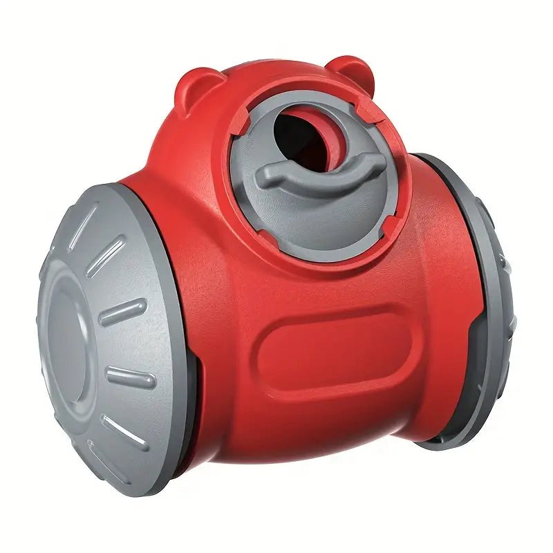 Red dog treat dispenser toy on a white background