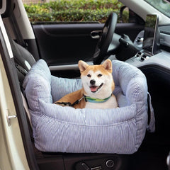 Pet booster car seat placed on the front seat with dog inside