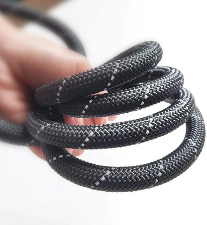 Close-up of durable, heavy-duty nylon rope dog leash in black with reflective stitching for safety and strength.