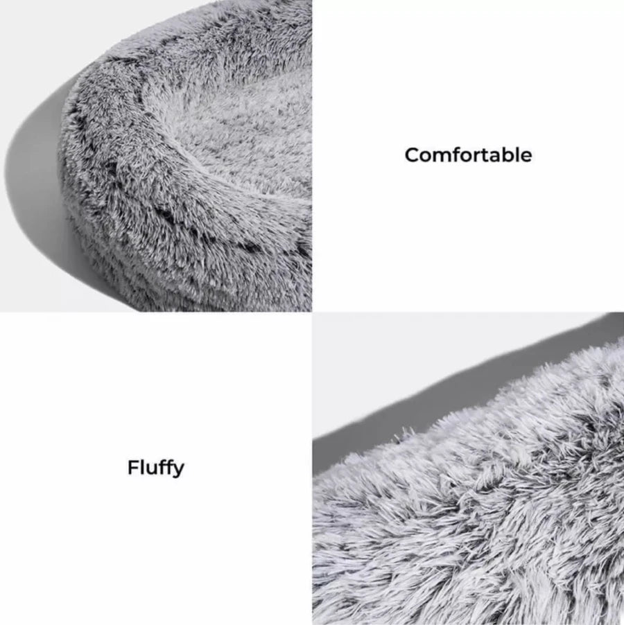 Close-up of a large fluffy dog bed, highlighting its comfortable and fluffy design for pets.