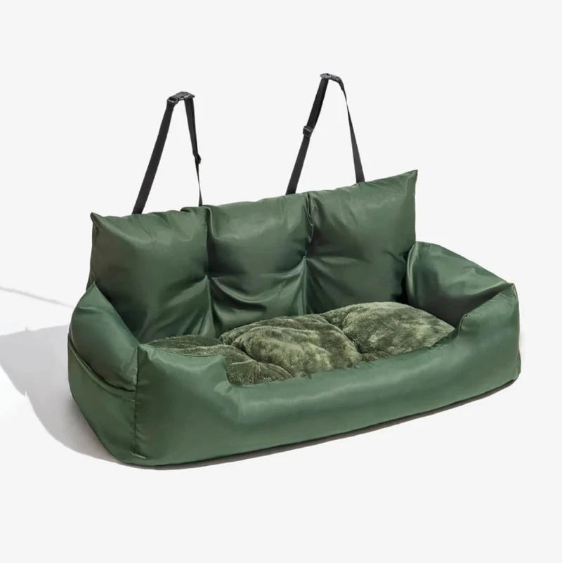 Large green travel dog car seat bed with plush cushion, adjustable straps, and durable fabric for safe and comfy journeys.