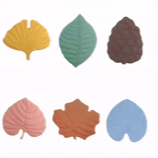 leaf mat for dogs presented in multiple colours on a white background