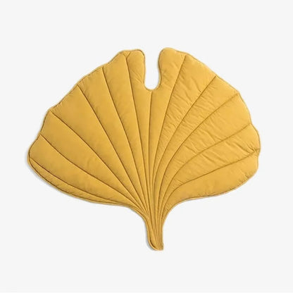 Yellow leaf-shaped pet mat, ideal for small pets to relax, providing a cozy and stylish addition to your home decor.