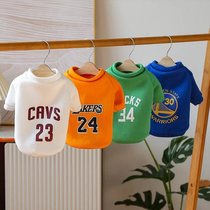 Colorful NBA dog sweaters featuring Cavs, Lakers, Bucks, and Warriors team logos, perfect for stylish pets and sports fans.