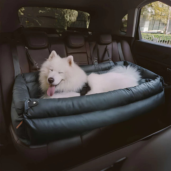 Large ocean blue pet car bed with Samoyed resting