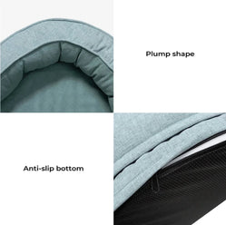 Oval dog bed with removable cover detail with zipper edge and anti-slip base