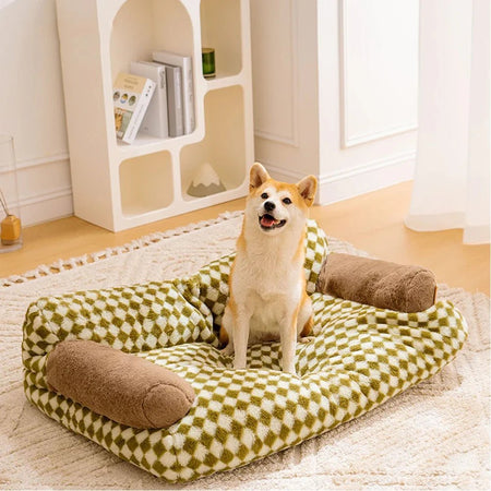 Shiba inu sitting on a plush pet sofa bed in a bright living room