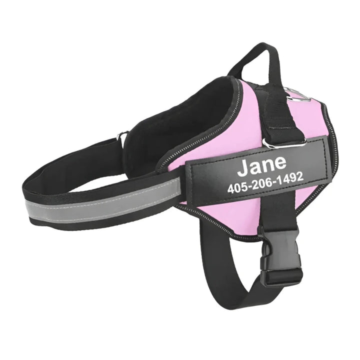 Light pink personalized reflective dog harness with custom name tag and phone number, ensuring safety and visibility.