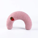 Pink calming pet pillow shaped like a donut, featuring a cute strawberry design 