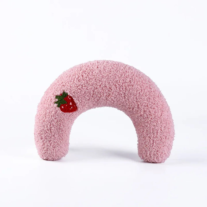 Pink calming pet pillow shaped like a donut, featuring a cute strawberry design 