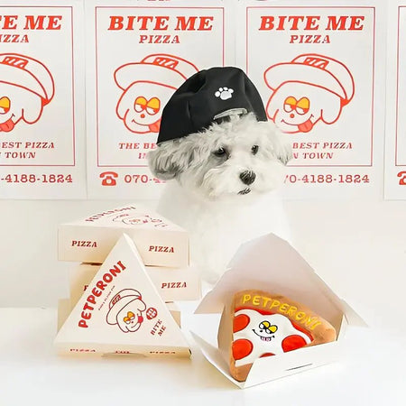 Pepperoni pizza dog toy shown with a small dog wearing a hat and pizza boxes