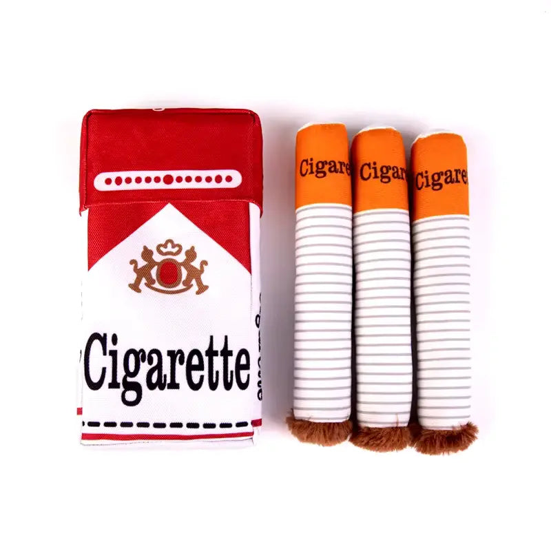 Plush dog toy set featuring a cigarette pack and three soft cigars on a white background.