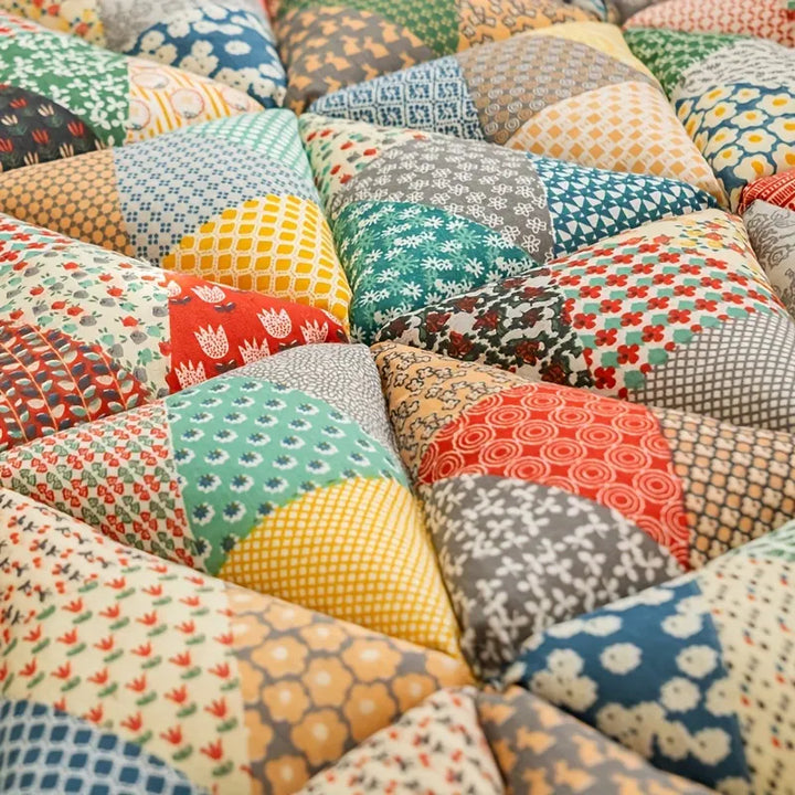 Colorful patchwork pet cover with various patterns