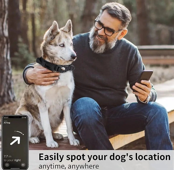 Man using smartphone to track his Husky with a tactical dog collar featuring an AirTag holder for easy location tracking.