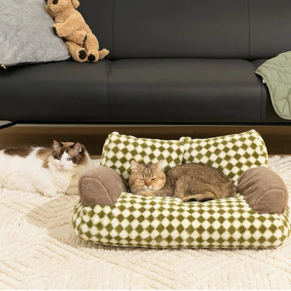 Two cats relaxing near a plush vintage-patterned pet sofa bed, perfect for cozy lounging and stylish home decor.