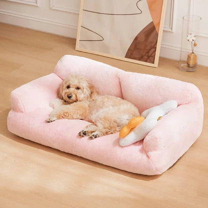 Fluffy dog relaxing on a pink vintage-style plush pet sofa bed, offering comfort and elegance for pets in any room.