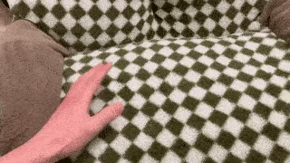 Demonstrating non-slip bottom of vintage dog and cat sofa bed for secure and stable pet comfort on any surface.