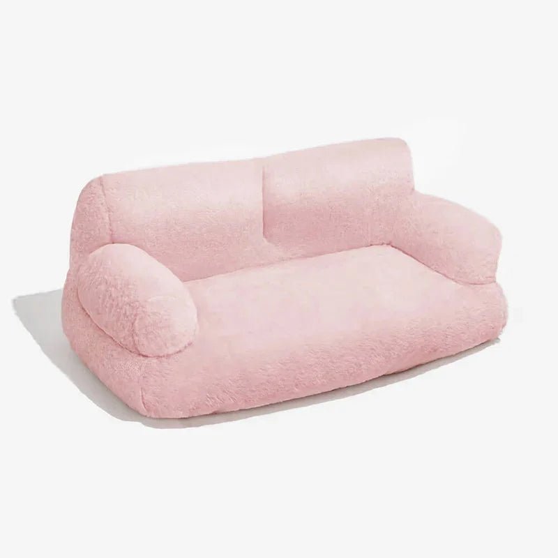 Soft pink vintage-style sofa bed for dogs and cats, offering plush comfort and a cozy lounging space for your pet.