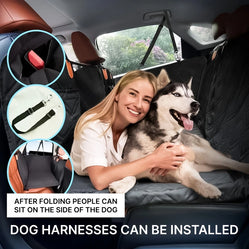 Woman hugging a happy husky on a hard bottom dog car seat protector